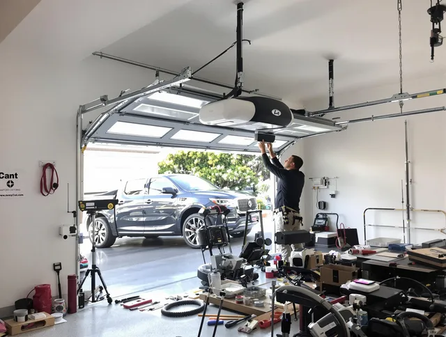 Walnut Garage Door Repair specialist installing smart garage door opener system in Walnut home