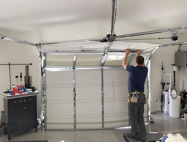 Walnut Garage Door Repair specialist performing precise section replacement on Walnut garage door