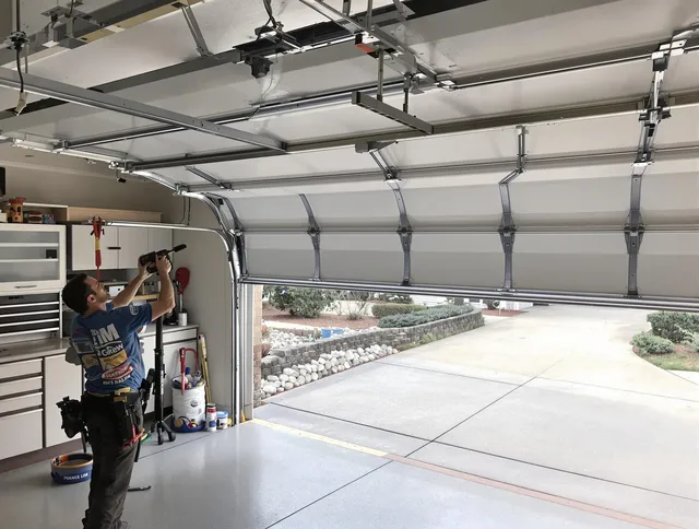 Garage door track repair service by Walnut Garage Door Repair in Walnut